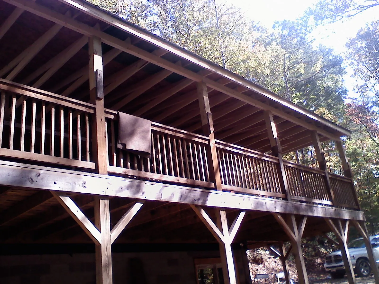 Timber framing under a new elevated porch and deck — Roof Leak Repair in New Philadelphia by Roofing Brothers